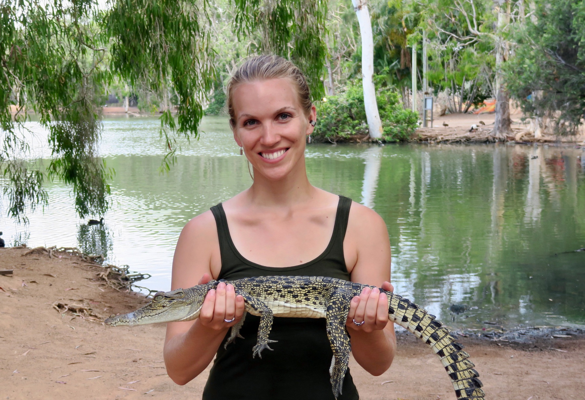 Holding a small crocodile at Billabong Sanctuary