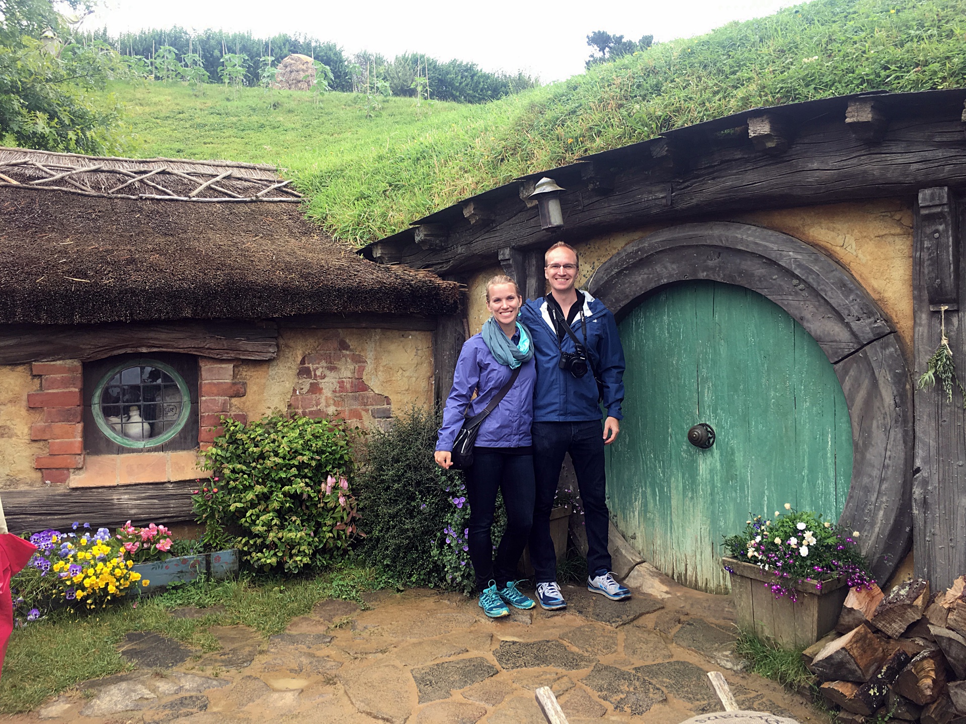 Us in front of a Hobbit Hole
