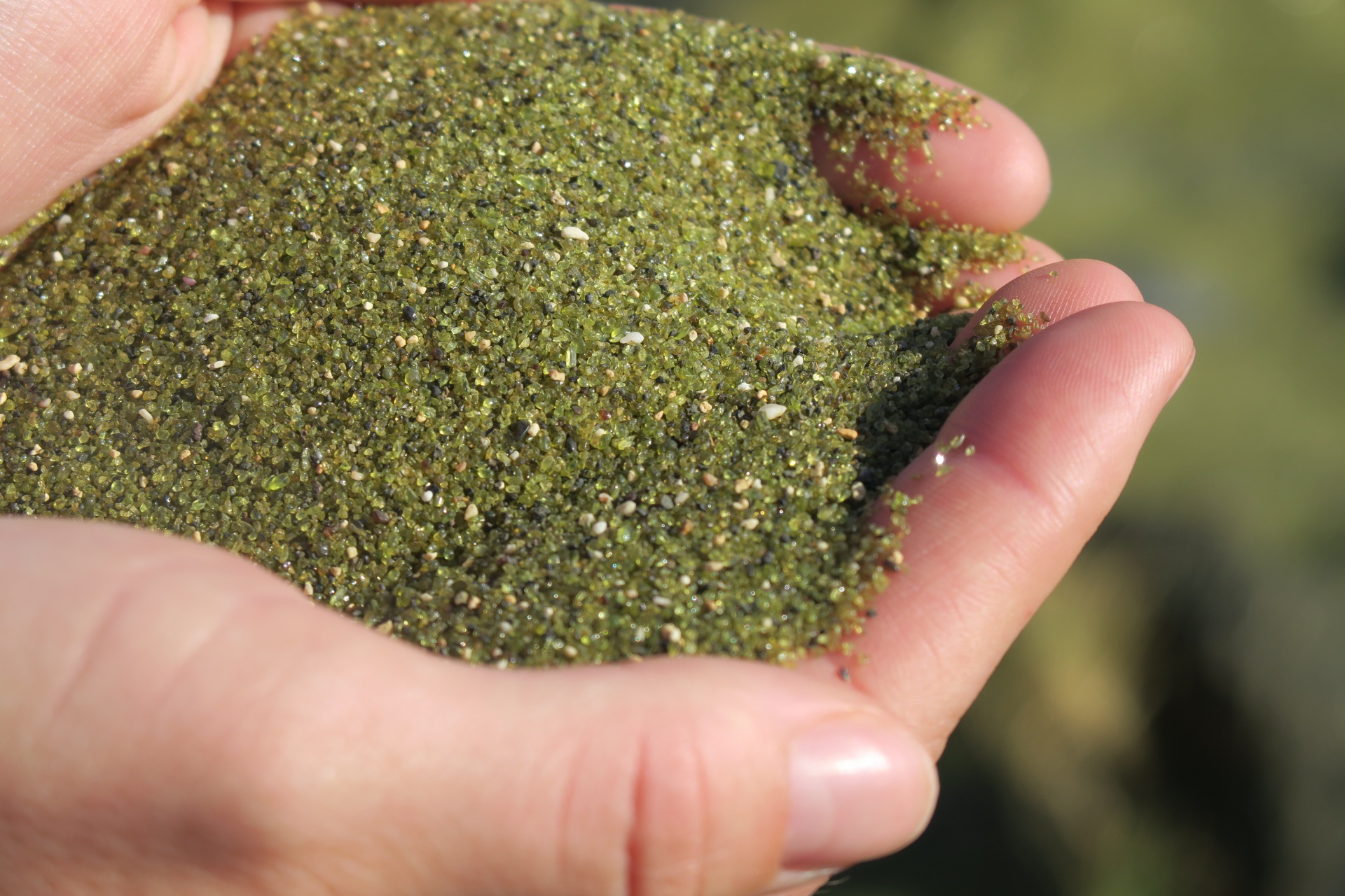 Close up of the green sand on Papakōlea beach.